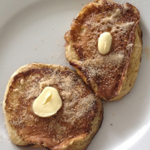 Banana pancakes with maple-sugar and butter